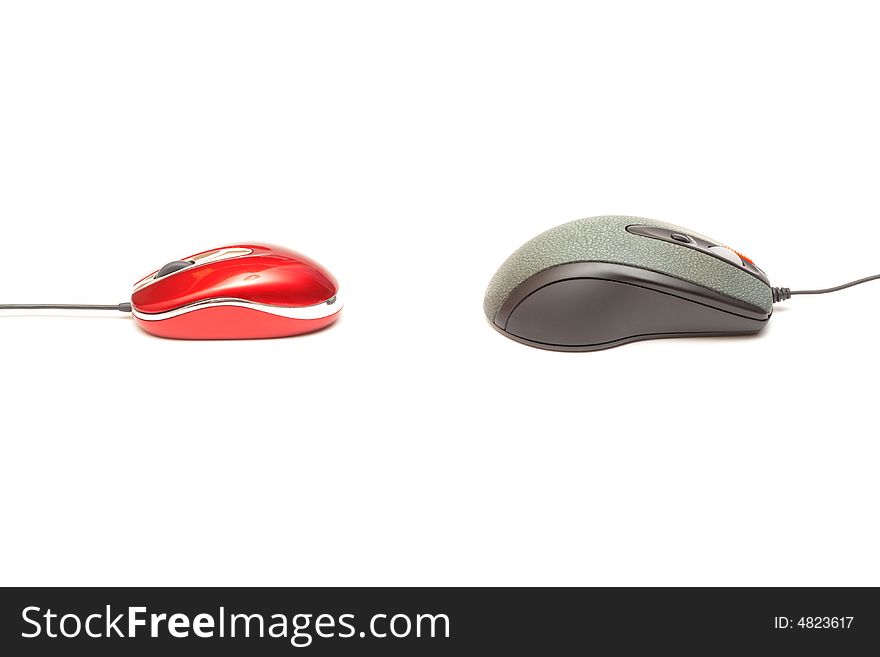 Red and grey computer mouses isolated on white. Red and grey computer mouses isolated on white