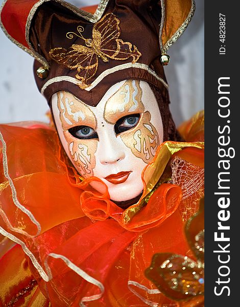 Orange butterfly costume at the Venice Carnival