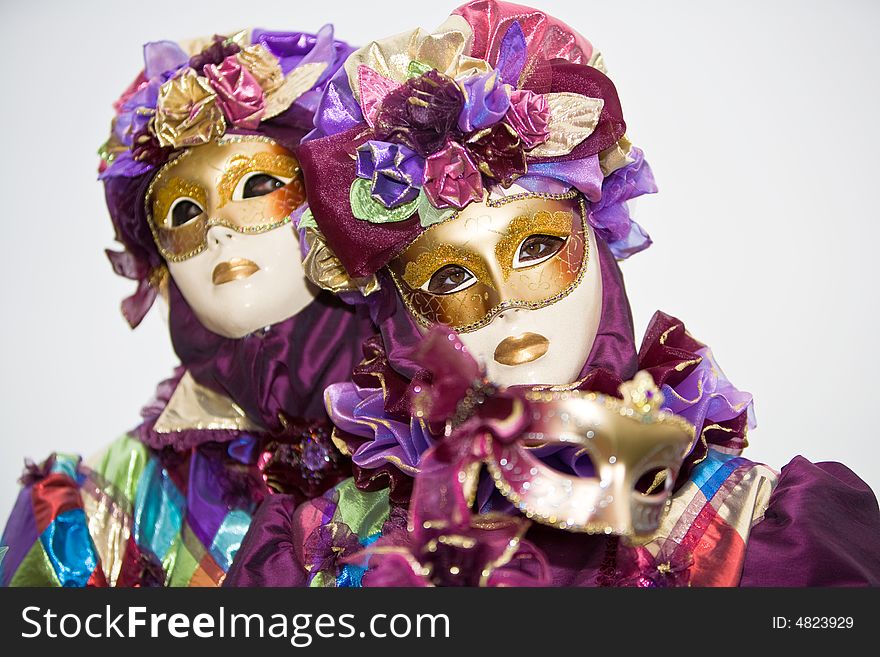 Purple costume with roses at the Venice Carnival. Purple costume with roses at the Venice Carnival