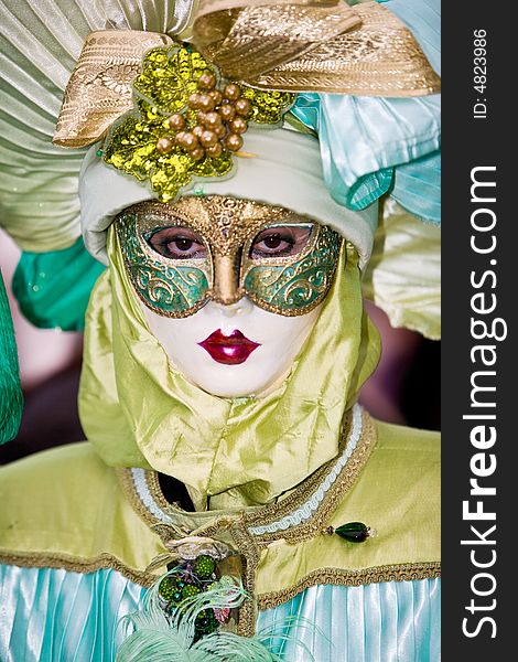 Green and blue costume at the Venice Carnival. Green and blue costume at the Venice Carnival
