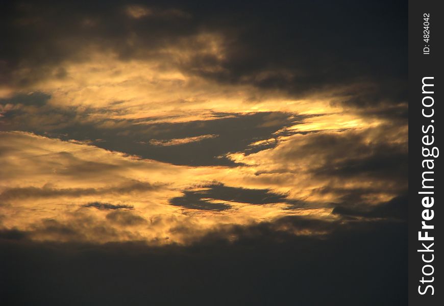 Clouds lit up by sunset light. Clouds lit up by sunset light