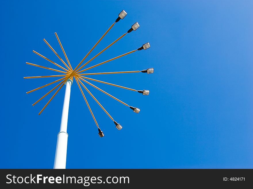 City series: lamppost at the day on a blue sky