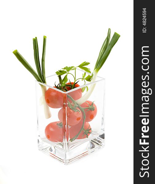 Tomatoes in a glass vase, healthy diet. Tomatoes in a glass vase, healthy diet