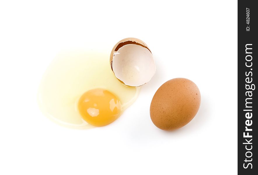 Cracked chicken egg with the yolk and the protein. Cracked chicken egg with the yolk and the protein