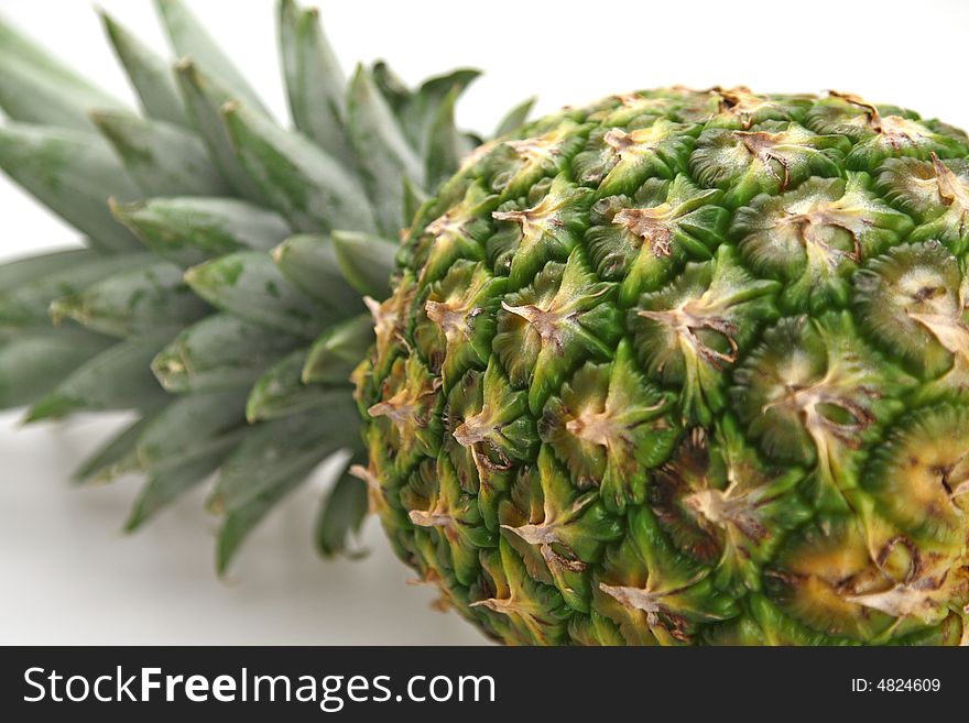 Close-up fresh pineapple ready to be sliced for desert or salad. Close-up fresh pineapple ready to be sliced for desert or salad