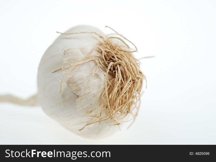 Close up to garlic isolated on white. Close up to garlic isolated on white