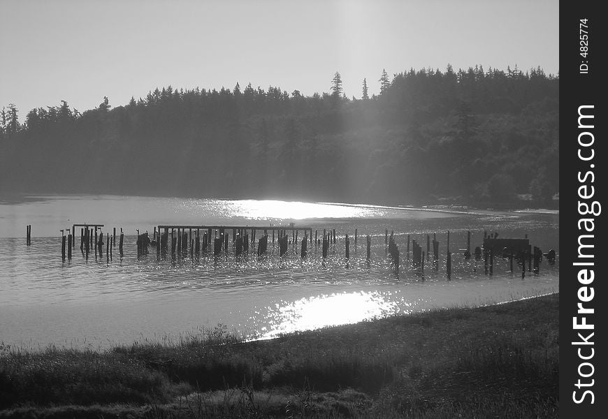 Debris of a pier after sunrise