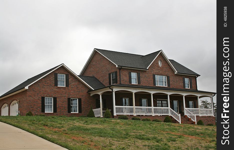 Large Brick home With two garages.