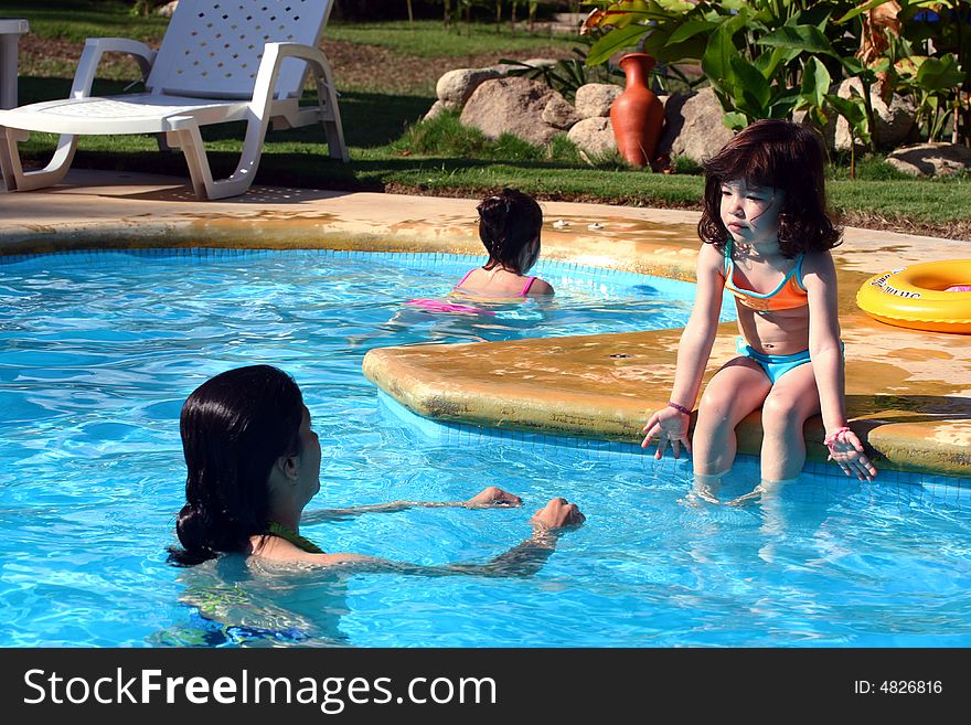 Young girl Swimming whit mama. Young girl Swimming whit mama