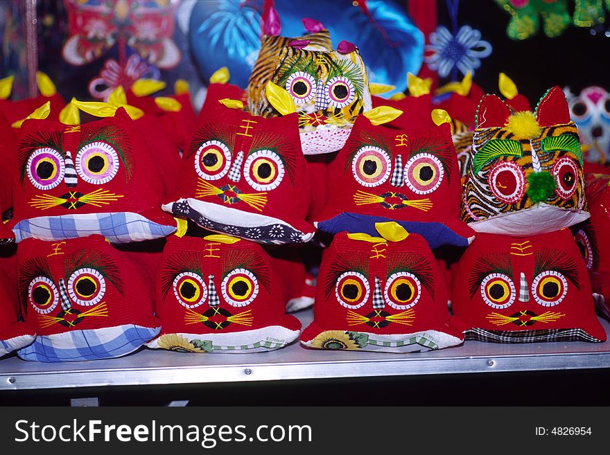 Tiger pillow is chinese traditional artwork for babies. it means lucky and bravery.