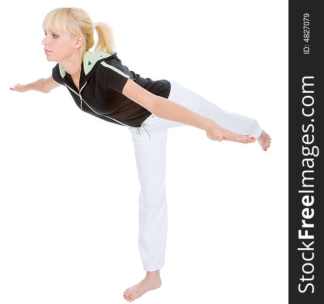 Young blondy doing yoga exercise