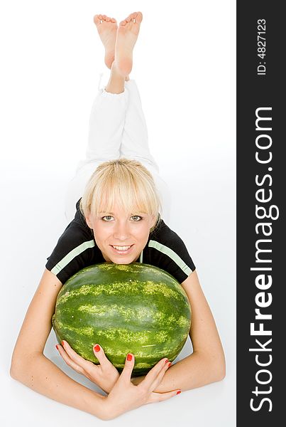 Beautiful young fruit-grower love to embrace water-melon