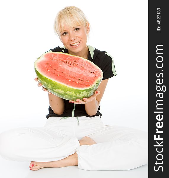 Beautiful young fruit-grower hold on a water-melon