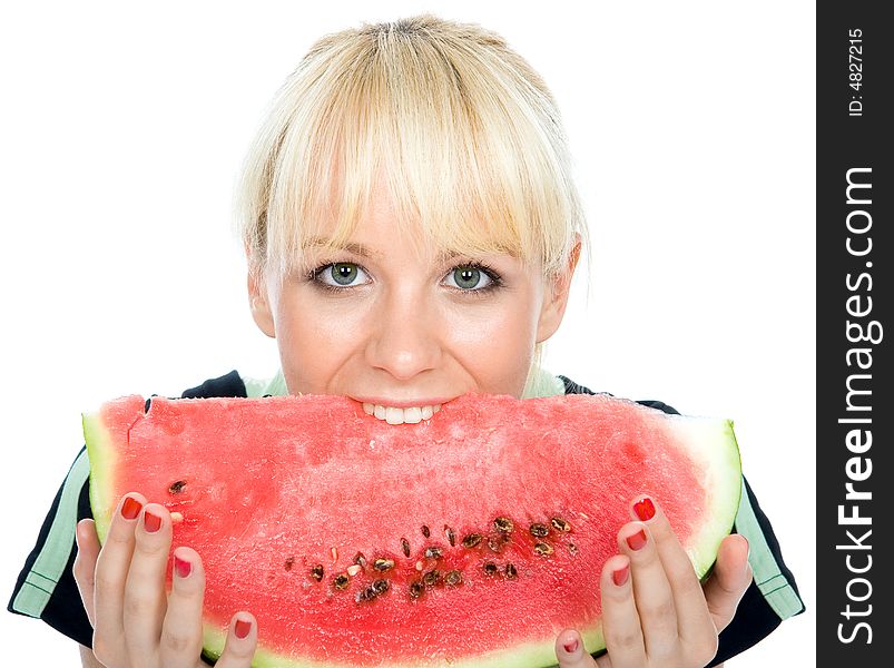 Beautiful young fruit-grower hold on a slice of water-melon