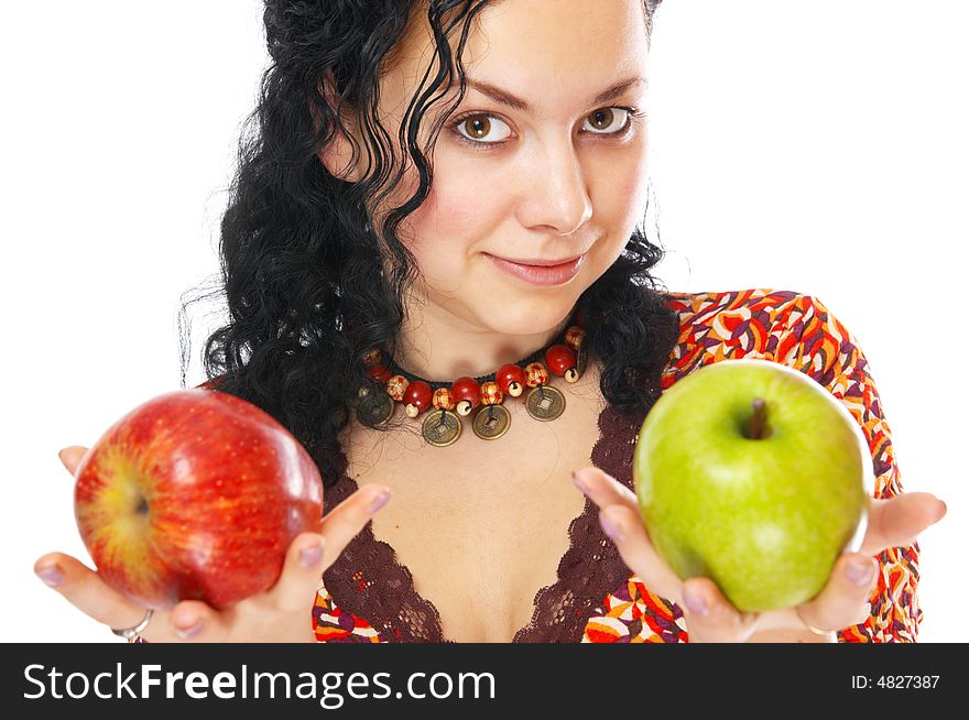 The beautiful girl holds two apples in hands