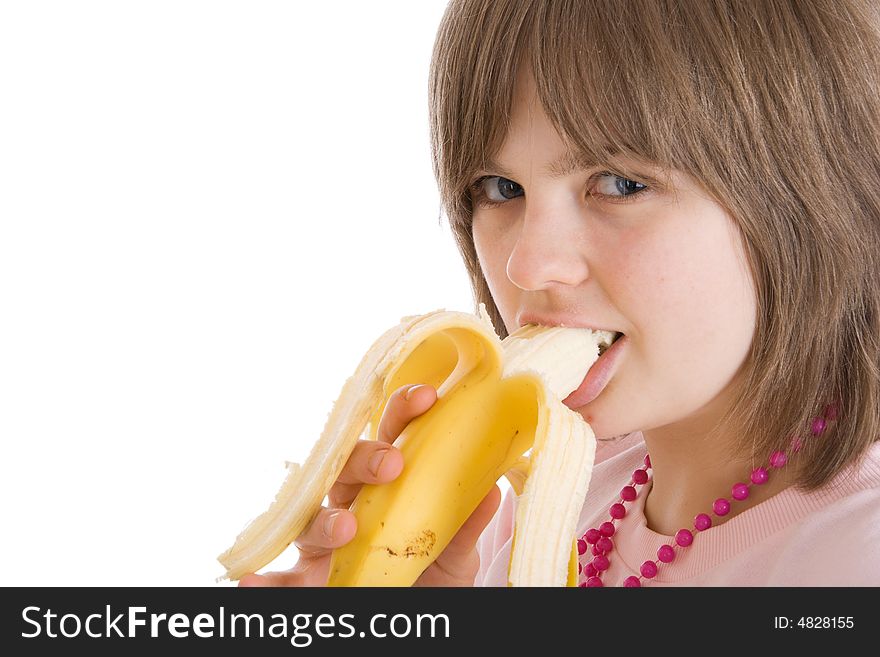 The young attractive girl with a banana isolated on a white background