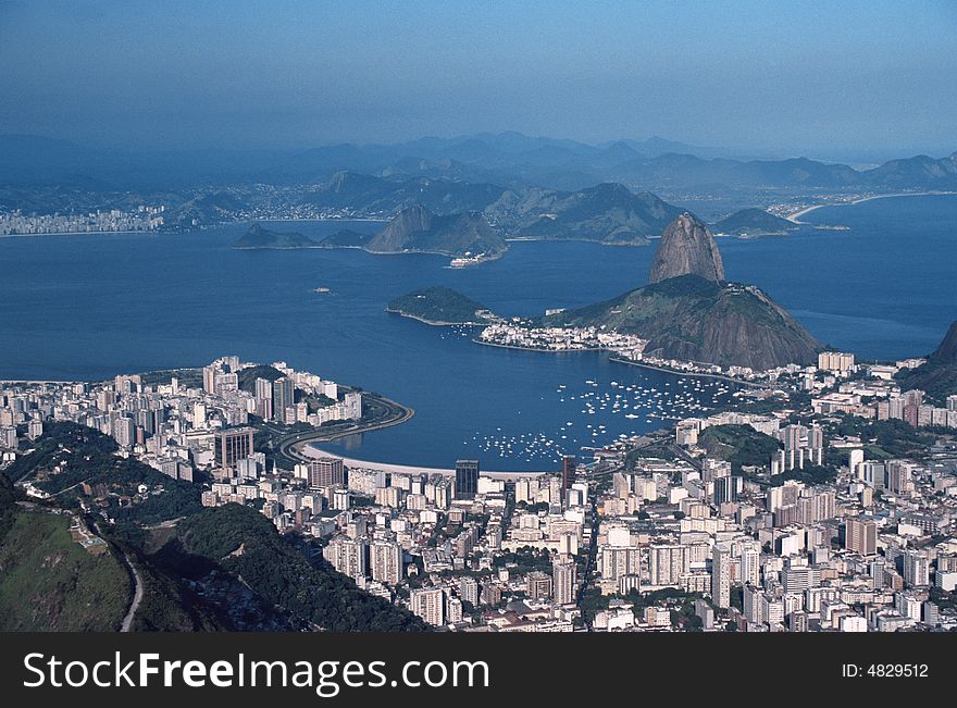 City bird's-eye view  with sea bay and mountainous terrain