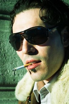 Sexy Man Smoking Cigarette Royalty Free Stock Image
