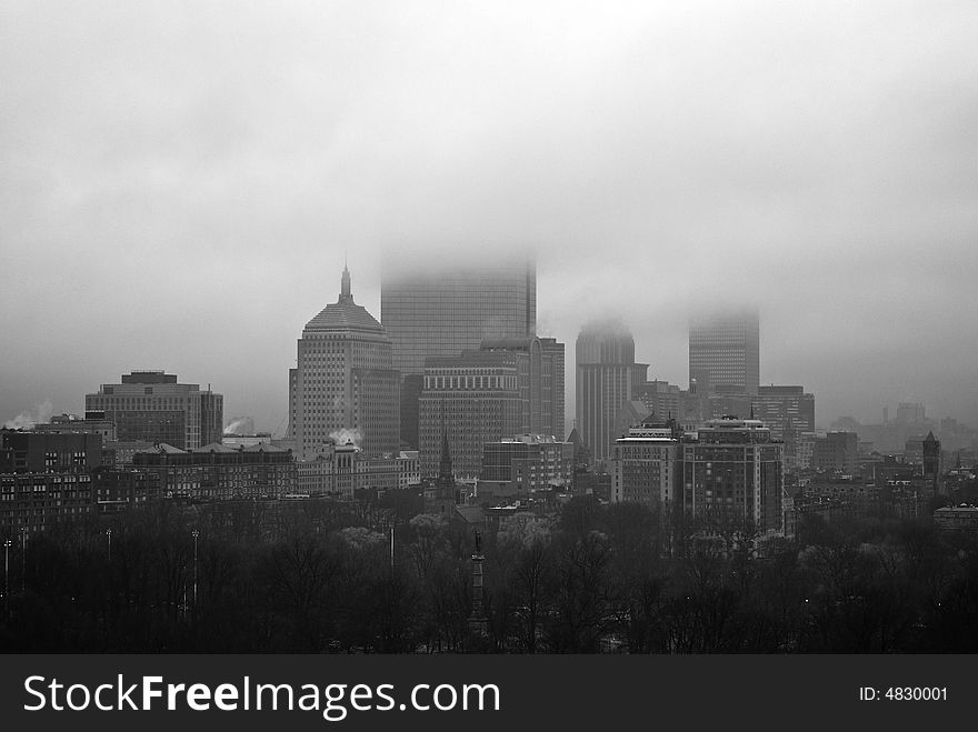 View of boston buildings obscured by clouds on a rainy morning in spring. View of boston buildings obscured by clouds on a rainy morning in spring