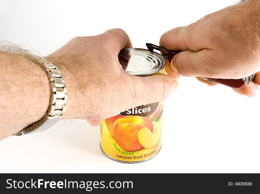 Opening a can of fruit with a pocket knife