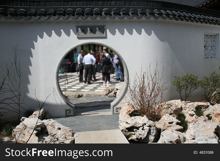 White wall with circular entrance and black edging. White wall with circular entrance and black edging.