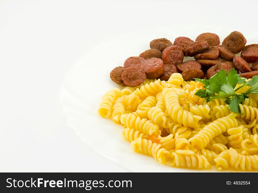 Fusilli and tomato sauce isolated over white. Fusilli and tomato sauce isolated over white