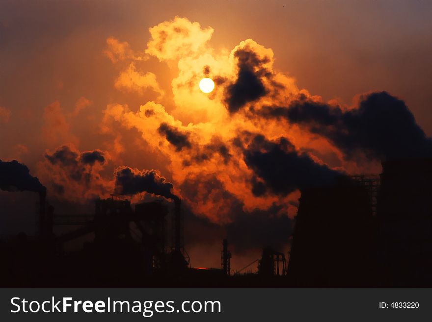 Metallurgy Plant on a brown background. Metallurgy Plant on a brown background