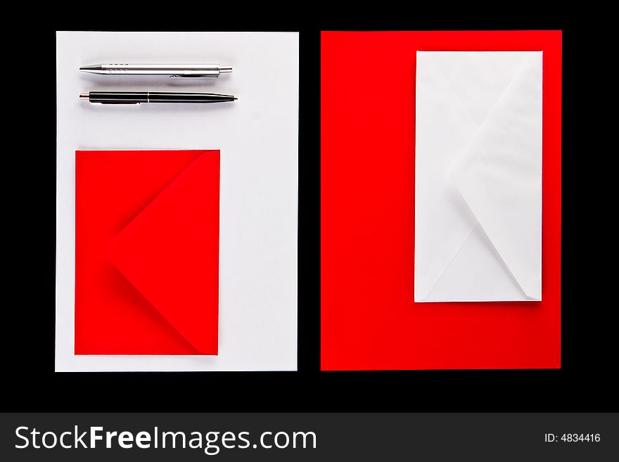 Envelopes and pens on a black background. Envelopes and pens on a black background