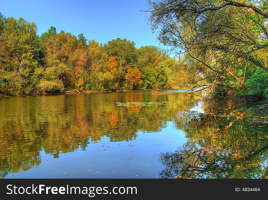 The shooting of the given exposition, was made in the early autumn, when foliage yet disgrace, and the trees have saved volume, early light has painted trees in juicy autumn colours. And certainly Reflection  of water have decorated a composition and that has given the completed kind. The shooting of the given exposition, was made in the early autumn, when foliage yet disgrace, and the trees have saved volume, early light has painted trees in juicy autumn colours. And certainly Reflection  of water have decorated a composition and that has given the completed kind.