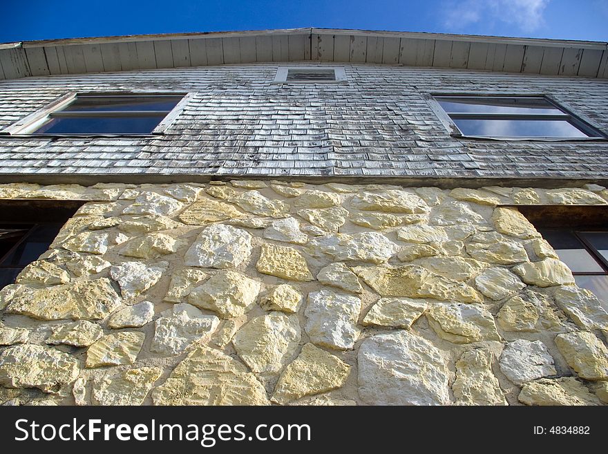 Old Stone Barn with weather siding on top