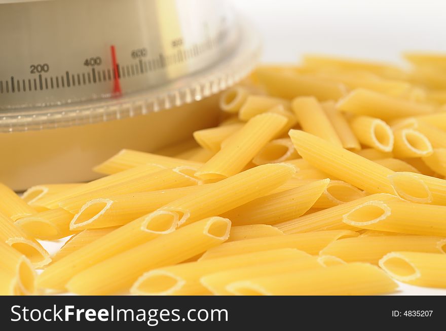 Italian penne pasta with a white balance
