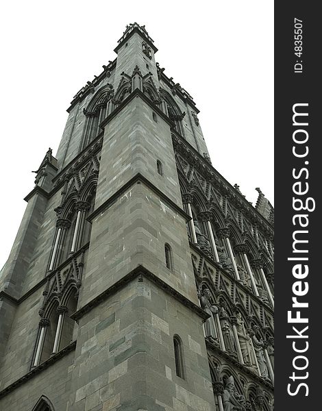 A tower of church in Trondheim city, ancient historical building, Norway