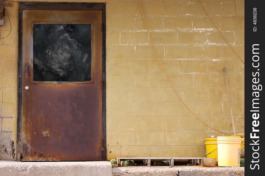 Old weathered door and brick wall. Old weathered door and brick wall