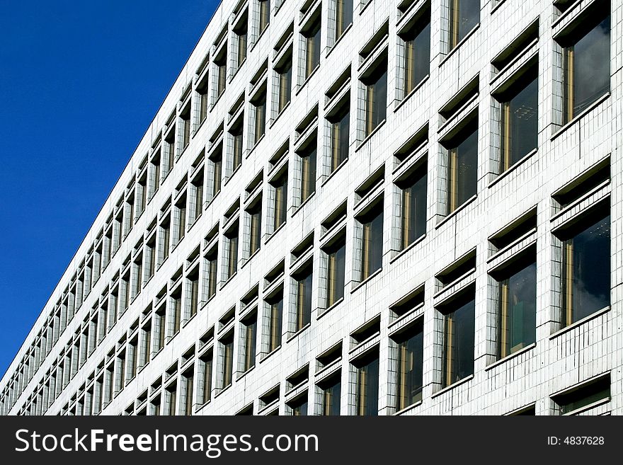 Long white business building with vanishing perspective. Long white business building with vanishing perspective