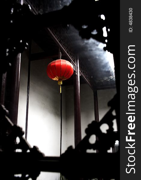 View of a red lantern through the window