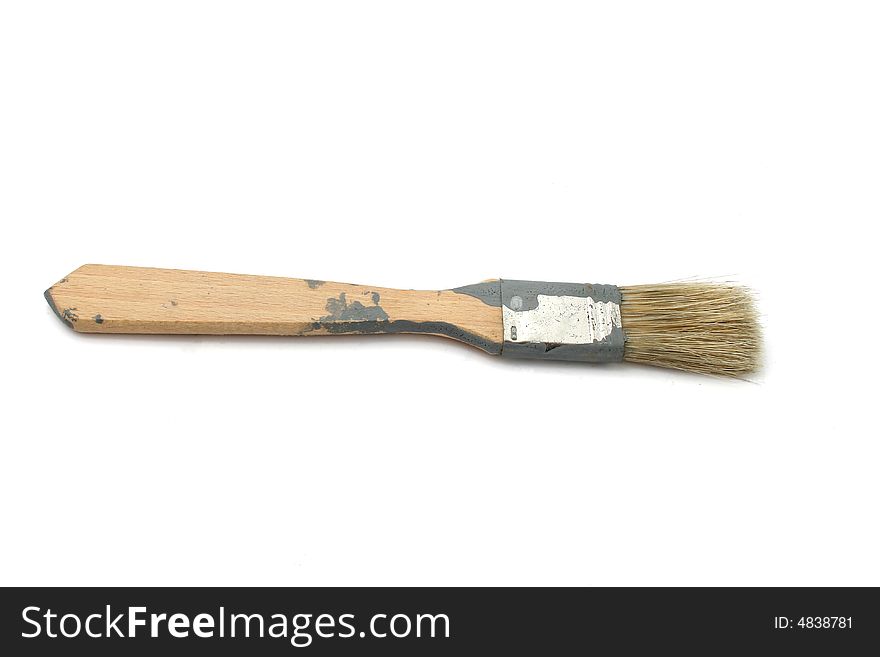 One used brush isolated on a white background. One used brush isolated on a white background