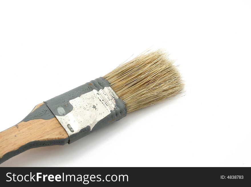 One used brush isolated on a white background. One used brush isolated on a white background