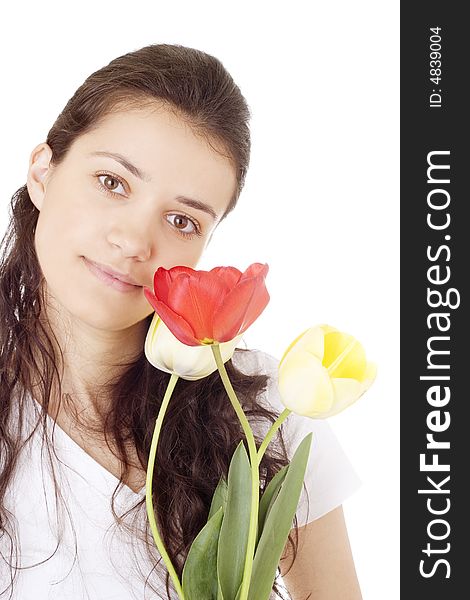 Young woman holding tulips. Isolated on white background