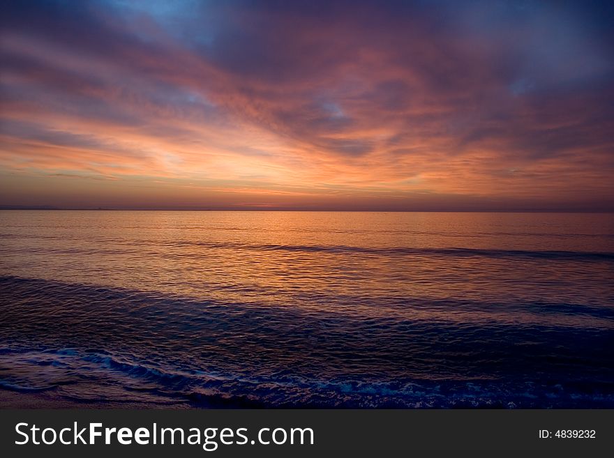 Red Sky.Black sea-Bulgaria-2008 It starts the new day. The sun punctures a road for itself in its oort clouds.Calo.The Bulgarian Black Sea Coast covers the whole eastern border of Bulgaria. Red Sky.Black sea-Bulgaria-2008 It starts the new day. The sun punctures a road for itself in its oort clouds.Calo.The Bulgarian Black Sea Coast covers the whole eastern border of Bulgaria.