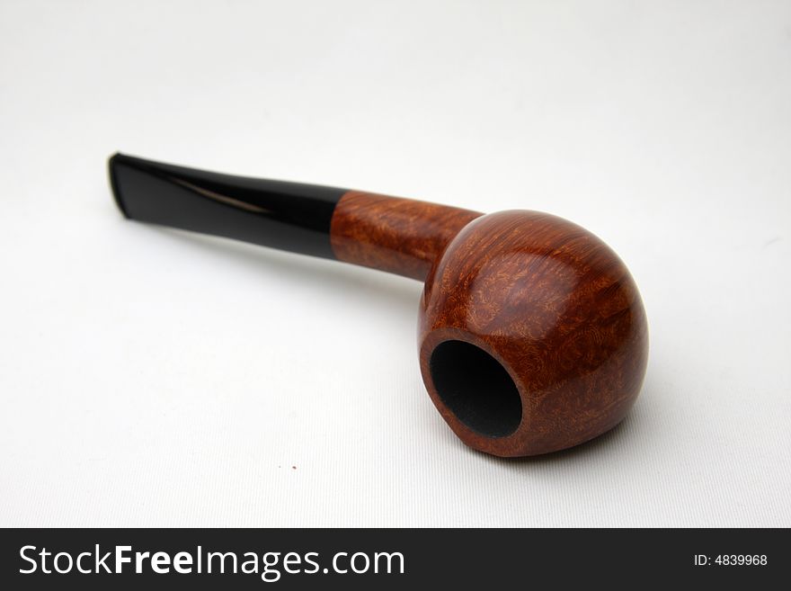 An tobacco pipe from Germany's on white background. An tobacco pipe from Germany's on white background.