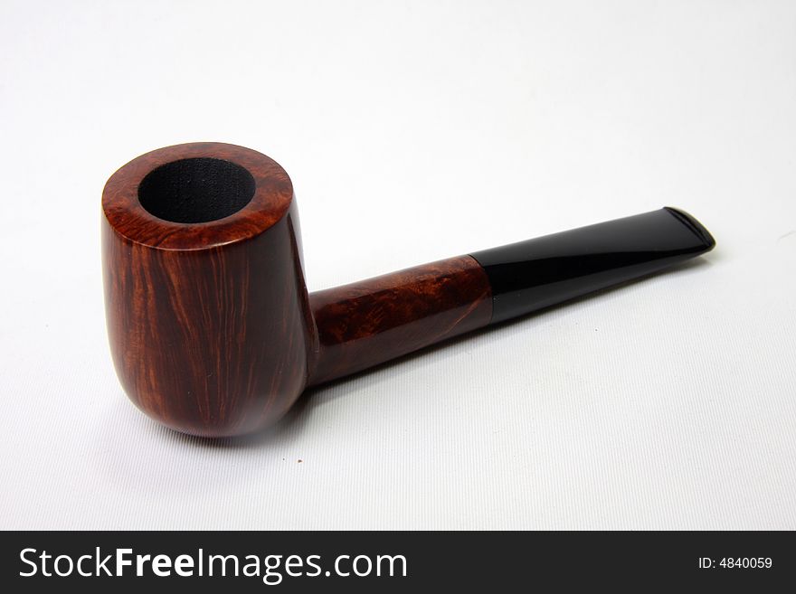 An tobacco pipe on white background.