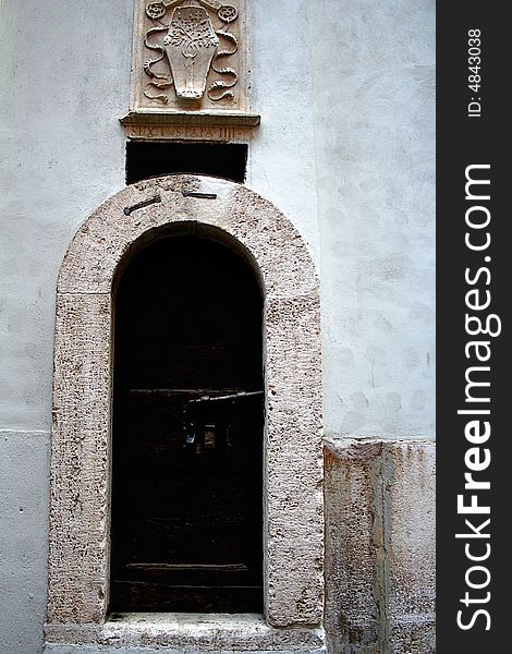 Door of the dead in an old home in Italy