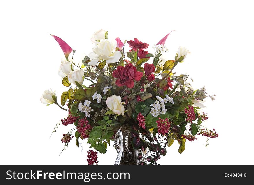A beautiful display of flowers in a vase on a white background. A beautiful display of flowers in a vase on a white background