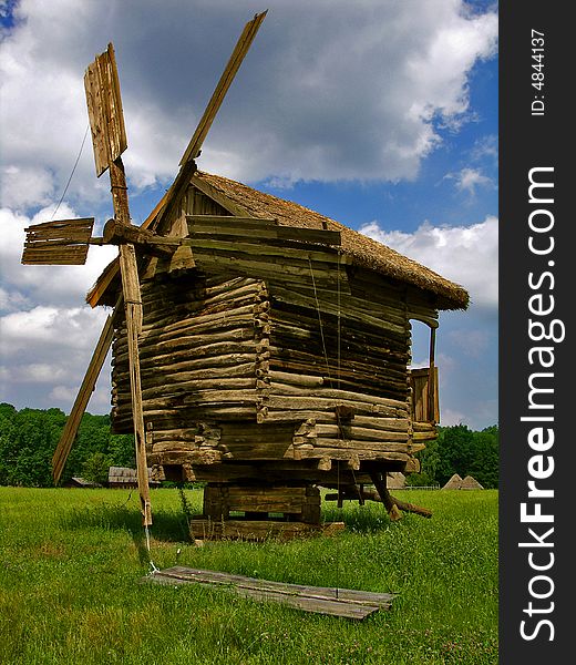 Ukrainian ancient  wooden mill in Pirogovo village. Ukrainian ancient  wooden mill in Pirogovo village