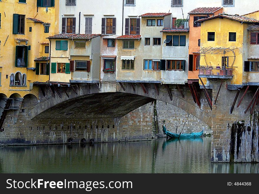 Houses on a bridge over River Arno in Florence, Italy. Houses on a bridge over River Arno in Florence, Italy.