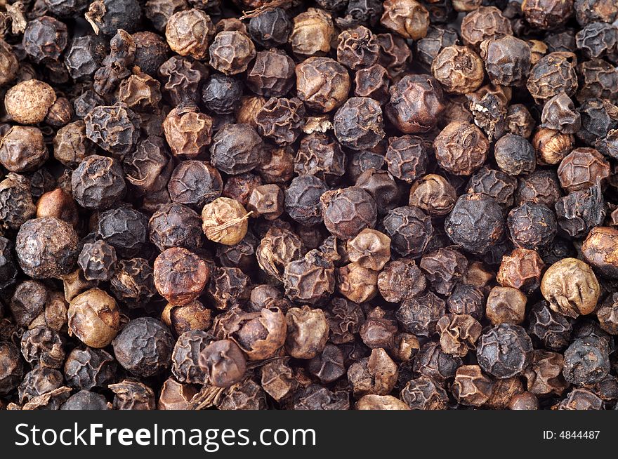 Close-up of peppercorns, top view