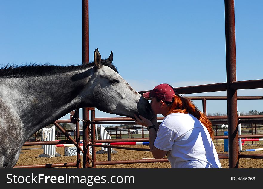 Woman Kissing Horse