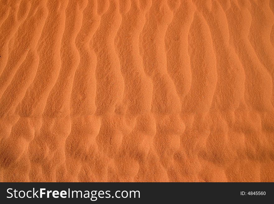 Close shot of a natural pattern in red sand. Rainbow valley, Southern Northern Territory, Australia. Close shot of a natural pattern in red sand. Rainbow valley, Southern Northern Territory, Australia