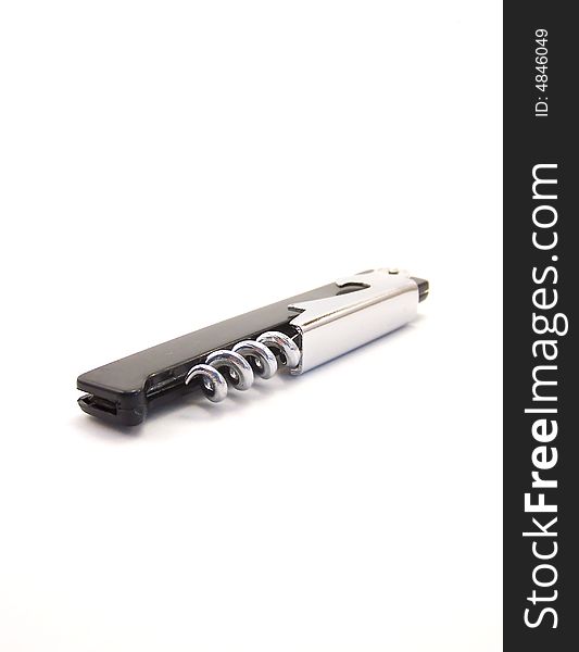 Image of a metal corkscrew with black handle.  Vertical orientation. Image of a metal corkscrew with black handle.  Vertical orientation.