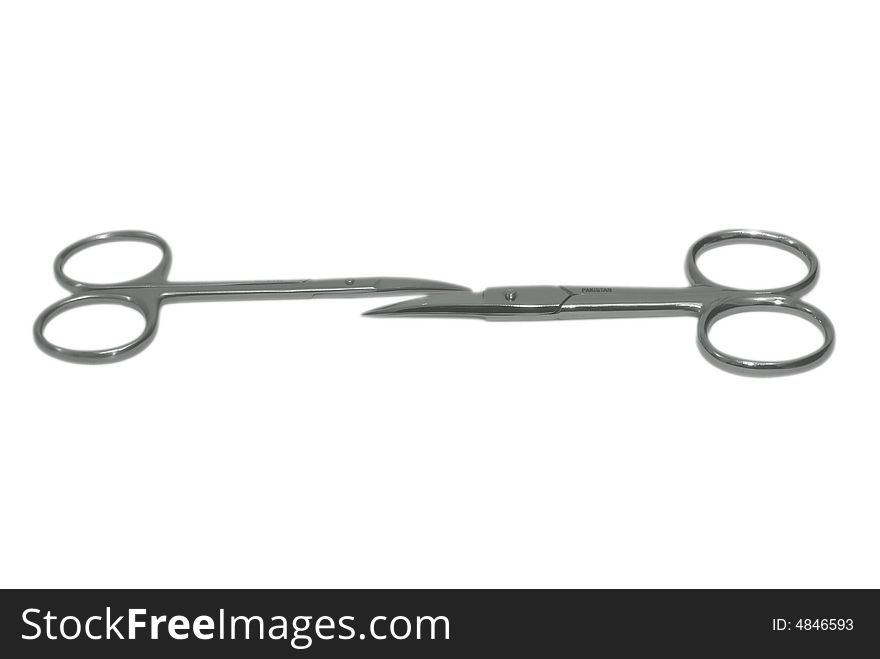 Manicure tools a pair of scissors  on white background. Manicure tools a pair of scissors  on white background